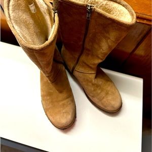 Used Ugg tall boots with lining. In very good conditions. Rarely used.